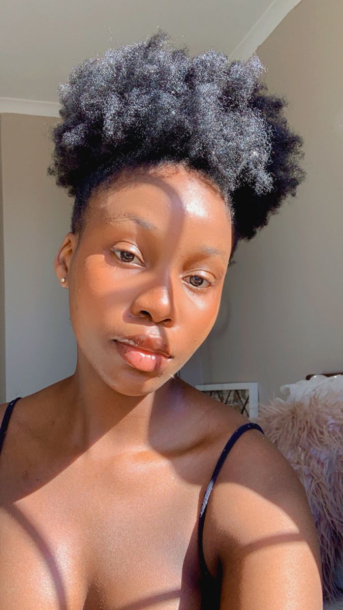 Smiling woman with clear skin after using Skin Luxe Natural