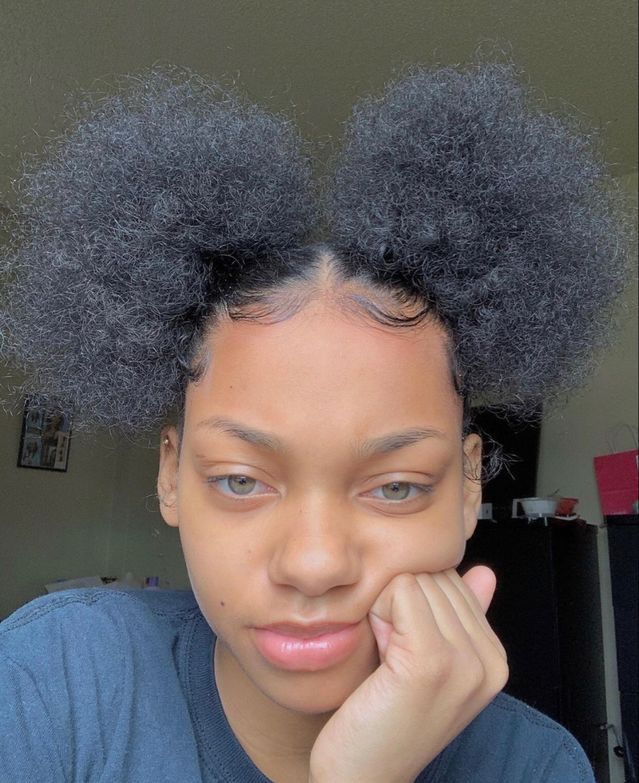 Happy customer holding Skin Luxe Natural face serum, showing glowing skin